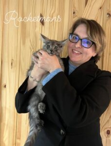 Rollo, black smoke male Maine Coon kitten with his new mom