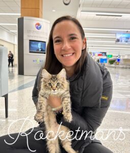 Arya with her new owner at the airport